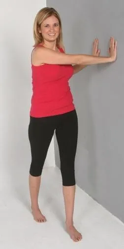 E:Exercise Library Pics - StretchesWall Rotation StretchWall Rotation Stretch (#1).JPG