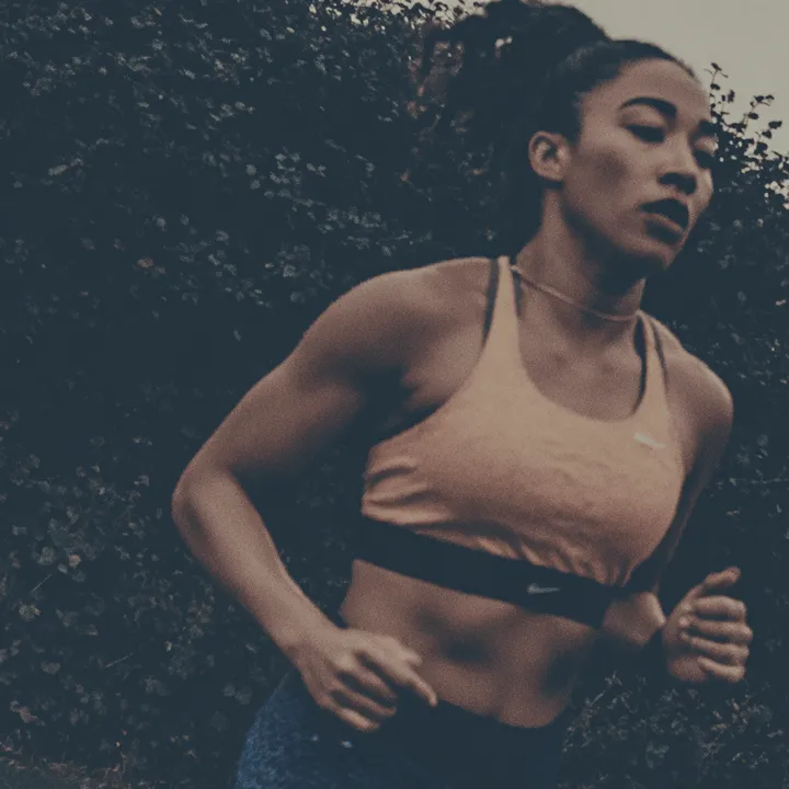 Woman resting during an outdoor running workout